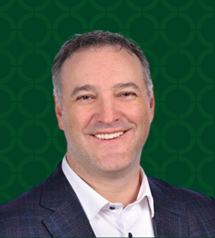 Photo of James Mallon on green background.