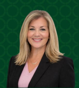 Photo of Shellie Vornhagen on a green background.